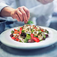 Chef preparing salad