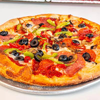 A pizza with olives, pepperoni, and green peppers