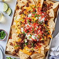 A plate with loaded nachos