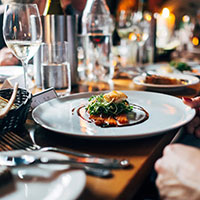 Fine dining table with honey glazed salmon