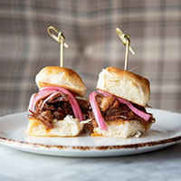 Two sliders with beef and onions