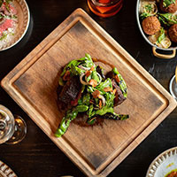 Steak with vegetables on top